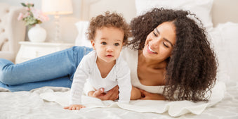 Mother with baby girl in bamboo diaper