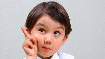 toddler with a 'thinking' facial expression