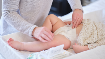 How should diapers fit?